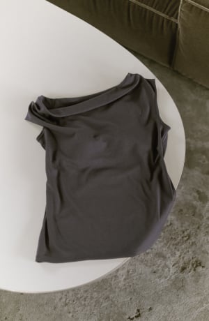 CUP IN ASYMMETRIC TOPS